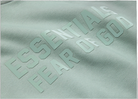 Fear of God Essentials S23 Hoodie Sycamore - PIKASTORE-Fear of God-pikastore.cz